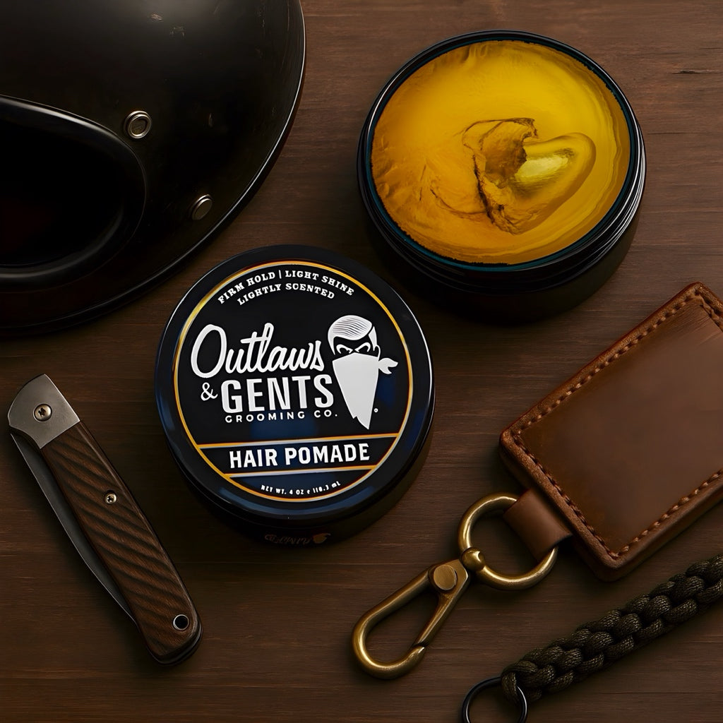 Outlaws and Gents Hair Pomade with men's sunglasses, wallet, and accessories