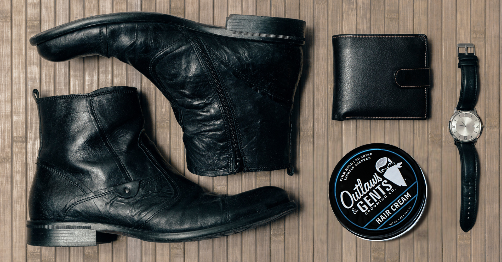 Outlaws and Gents hair cream with mans leather boots, watch and wallet