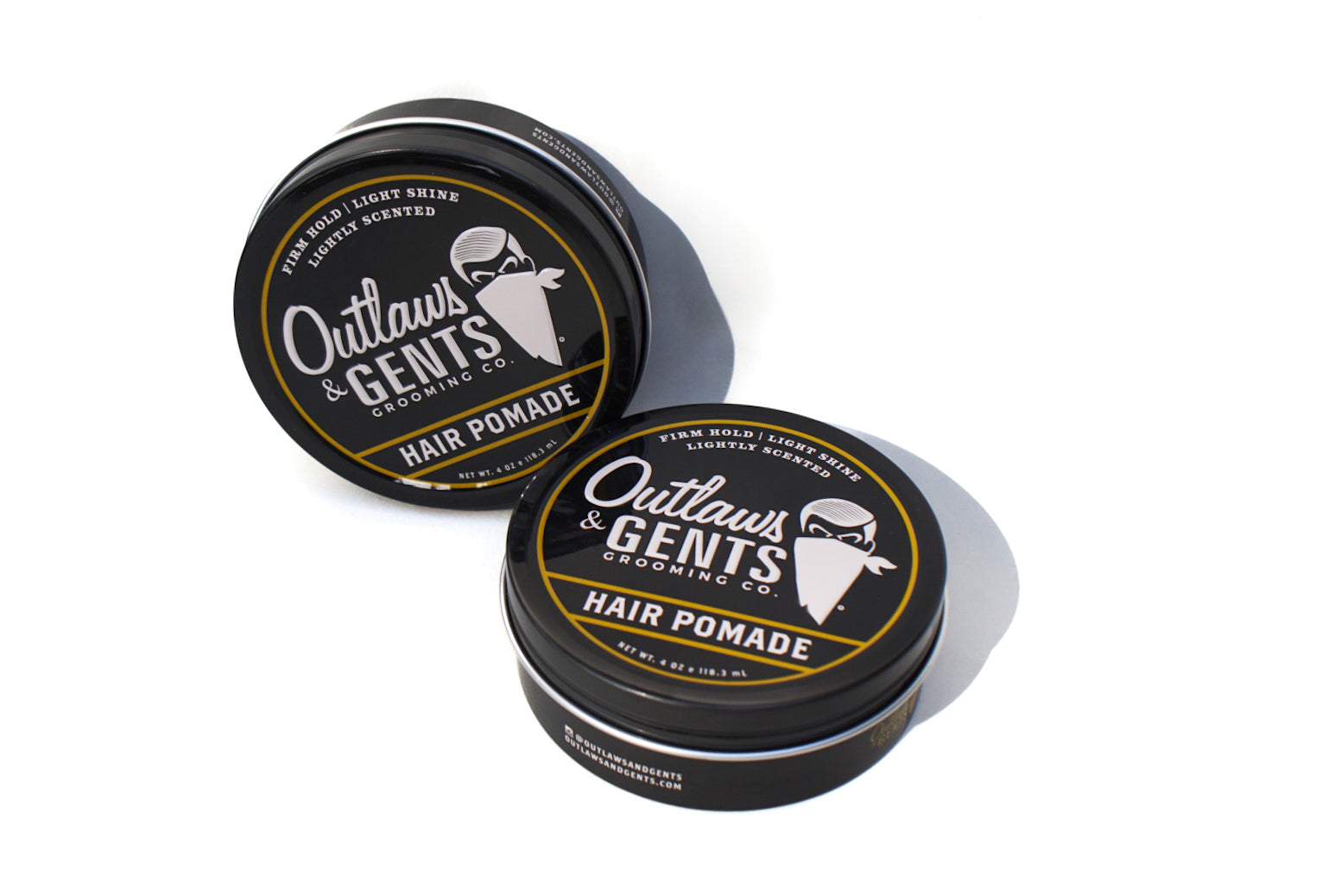2 pucks of Outlaws and Gents hair pomade